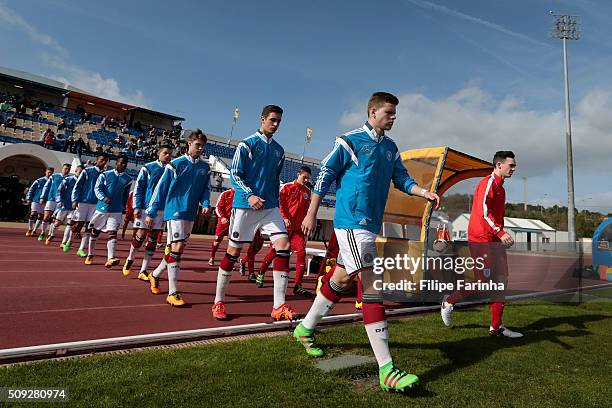 The teams enter the pitch during the UEFA Under17 match between U17 England v U17 Germany on February 7, 2016 in Lagos, Portugal. "n"n