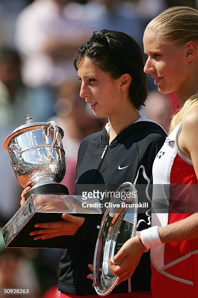 Anastasia Myskina of Russia with the trophy after winning her womens final match against Elena Dementieva of Russia during Day Thirteen of the 2004...