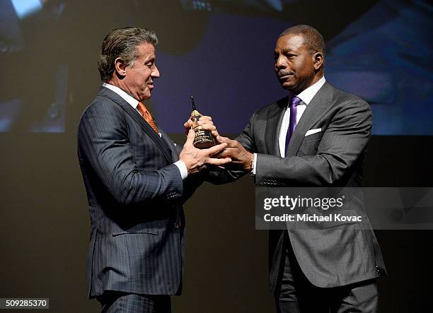 Actor Carl Weathers presents actor Sylvester Stallone with the Montecito Award onstage at The Santa Barbara International Film Festival on February...