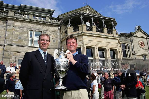 His Royal Higness Prince Andrew the Duke of York, Captain of the Royal and Ancient Golf Club of St Andrews, presents the trophy to Stuart Wilson of...