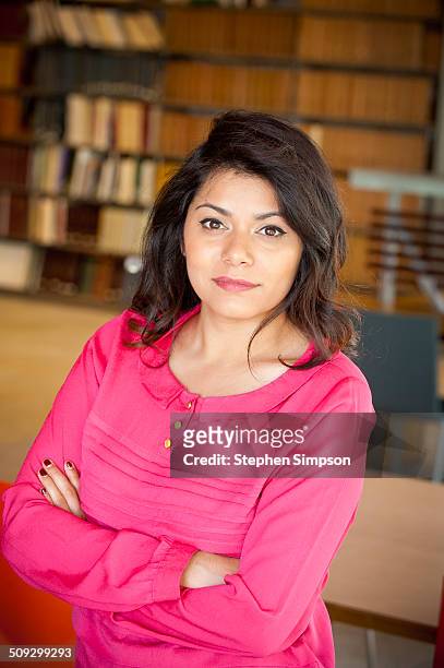 simple portrait of confident young businesswoman - rosa bluse stock-fotos und bilder