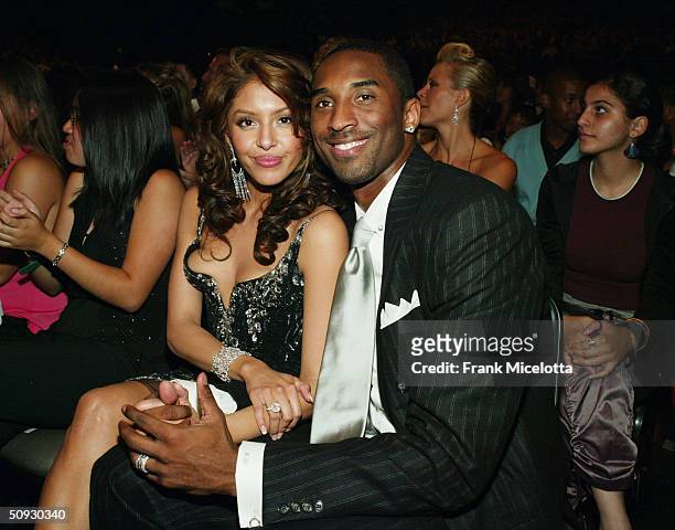 Professional basketball player Kobe Bryant and his wife Vanessa pose at the 2004 MTV Movie Awards at the Sony Pictures Studios on June 5, 2004 in...