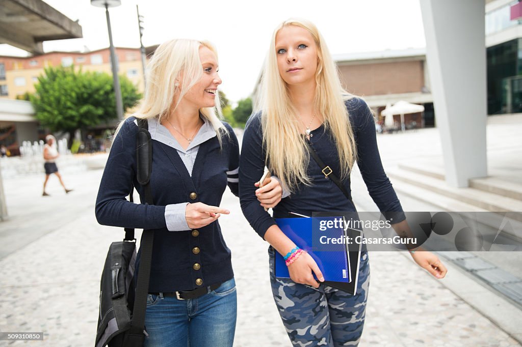 Beautiful Caucasian Students Walking in a City Outdoors