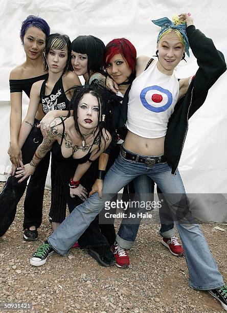 Suicide Girls pose backstage at day one of the "Download Festival" at Donington Park, on June 5, 2004 in Leicestershire, England. The rock festival...