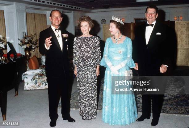 Her Majesty Queen Elizabeth II , wearing tiara and diamonds, with her husband Prince Philip , former US President Ronald Reagan , and his wife Nancy...