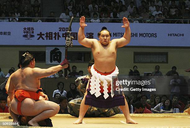 Sumo wrestling superstar Asasyoryu performs during a pre-competition ceremony, on June 6 in Beijing, China. A total of 111 sumo wrestlers are in...