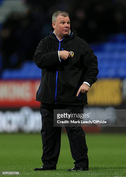 Leeds manager Steve Evans points to the badge on his chest after the Emirates FA Cup Fourth Round match between Bolton Wanderers and Leeds United at...