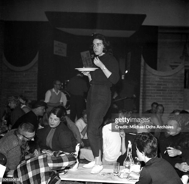 Gene Nelson at Pandora's Coffee House on Sunset Boulevard in Los Angeles,California."n "nGene Nelson