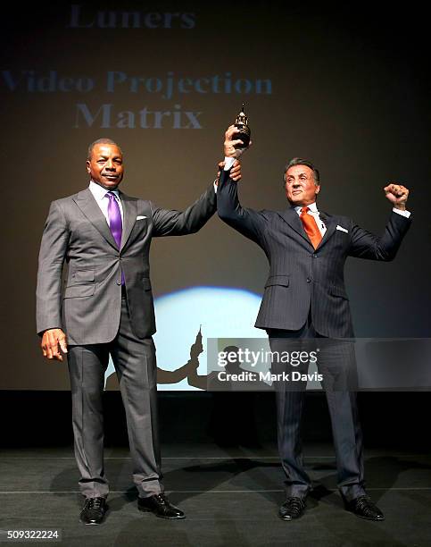 Actor Carl Weathers presents the Montecito Award to Actor Sylvester Stallone at the Arlington Theater at the 31st Santa Barbara International Film...