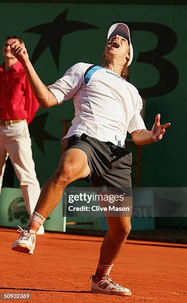 Gaston Gaudio of Argentina celebrates after winning his men's final match against Guillermo Coria of Argentina during Day Fourteen of the 2004 French...