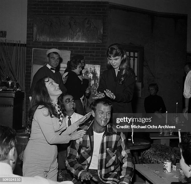 Actor Gene Nelson plays the bongos at Pandora's Coffee House on Sunset Boulevard in Los Angeles,California. Gene Nelson