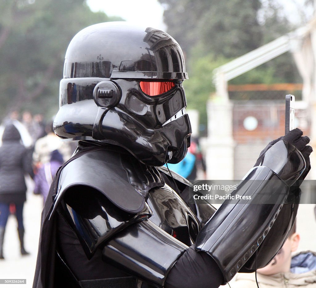 A man dressed in carnival costumes as Star Wars characters...