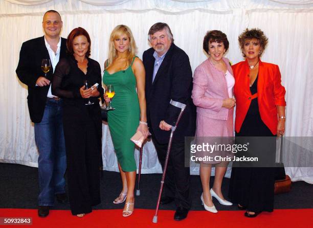 Al Murray, Belinda Carlise, Abi Titmuss, Roger Cook, Edwina Currie and Amanda Barry pose for the cameras at reality television program "Hell's...