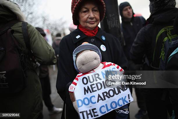 Demonstrators gather outside St Thomas's Hospital on February 10 in London, England. Junior Doctors across the United Kingdom began a 24 hour strike...