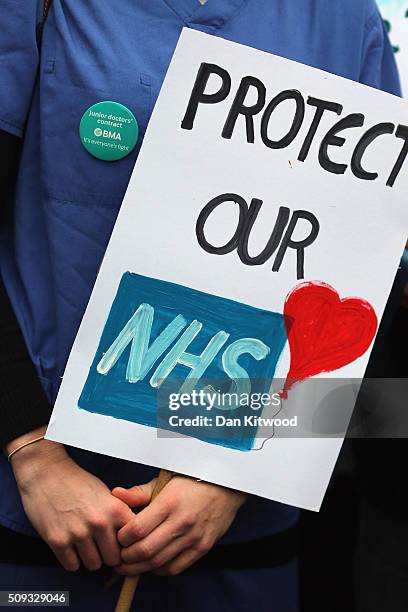 Junior Doctors carry placards on Westminster Bridge as they demonstrate outside St Thomas's Hospital on February 10 in London, England. Junior...