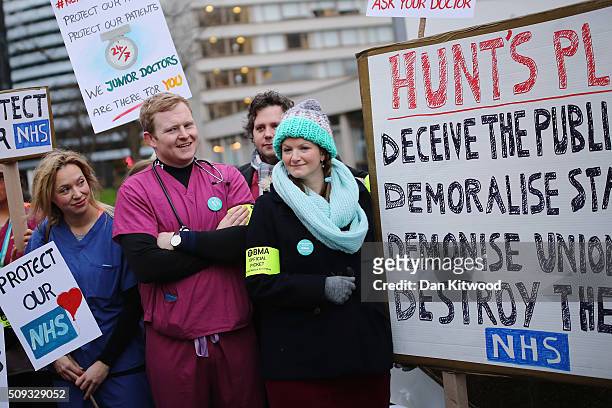 Junior Doctors carry placards on Westminster Bridge as they demonstrate outside St Thomas's Hospital on February 10 in London, England. Junior...