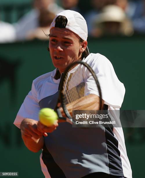 Guillermo Coria of Argentina returns in his mens final match against Gaston Gaudio of Argentina during Day Fourteen of the 2004 French Open Tennis...