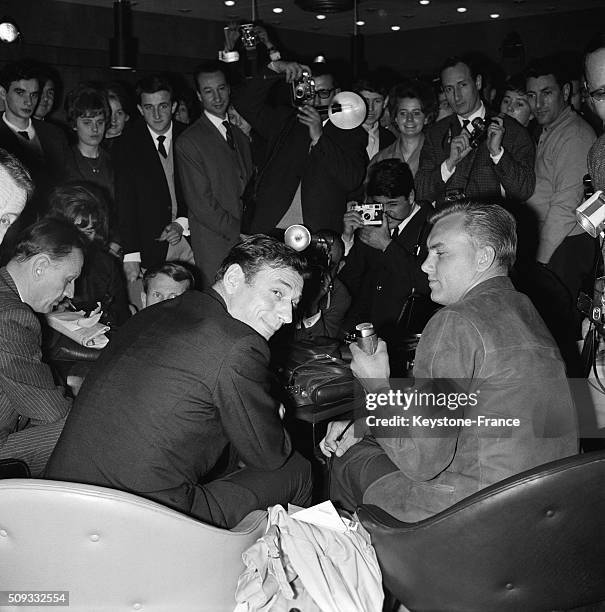 Yves Montand At Paris Orly Airport, Back From Japan, With Journalist Christian Brincourt, in Orly, France, on May 26, 1962.