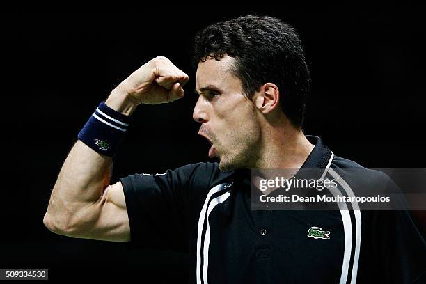 Roberto Bautista Agut of Spain celebrates victory against Joao Sousa of Portugal during day 3 of the ABN AMRO World Tennis Tournament held at Ahoy...