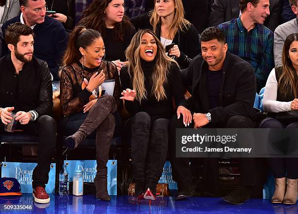 La La Anthony, Ciara and Russell Wilson attend the Washington Wizards vs New York Knicks game at Madison Square Garden on February 9, 2016 in New...