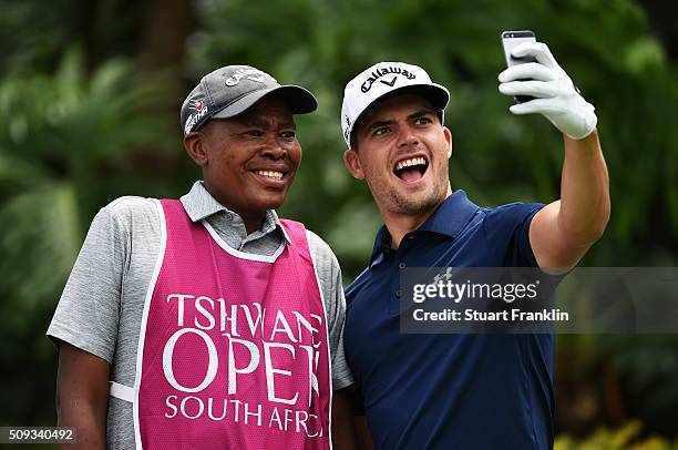 Haydn Porteous of South Africa takes a selfie with his caddie prior to the start of the Tshwane Open at Pretoria Country Club on February 10, 2016 in...