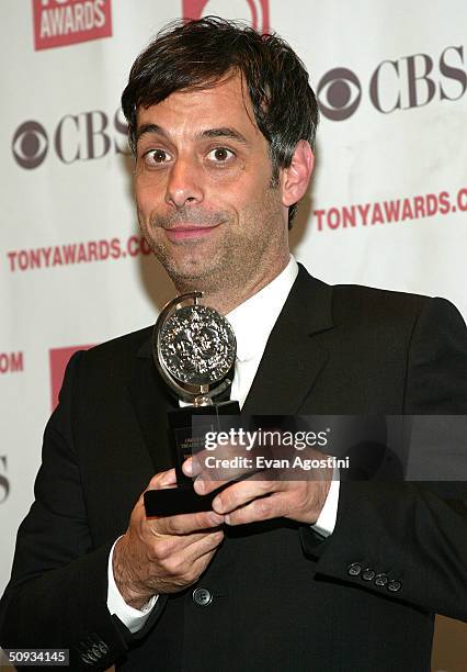 Tony Award winner Joe Mantello holds his award as he attends the "58th Annual Tony Awards" at Radio City Music Hall on June 6, 2004 in New York City....