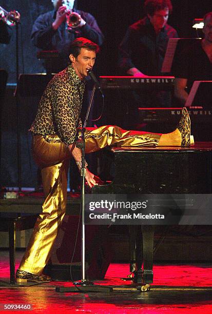 Actor Hugh Jackman performs on stage during the "58th Annual Tony Awards" at Radio City Music Hall on June 6, 2004 in New York City. The Tony Awards...