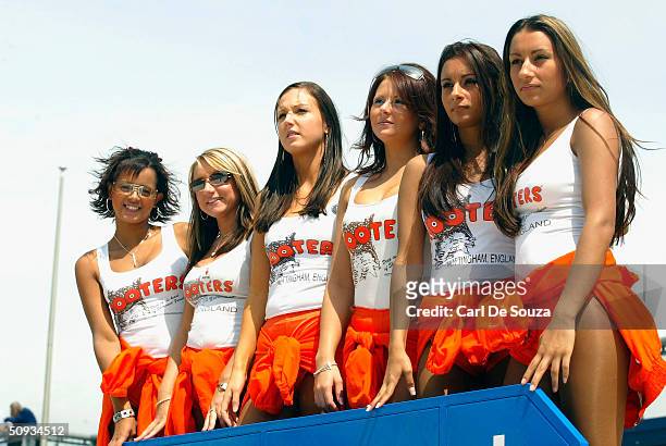 The Hooters pit girls watch the "Days of Thunder" motorsport event, following a day of racing, at the Rockingham Motor Speedway, Corby on June 6,...