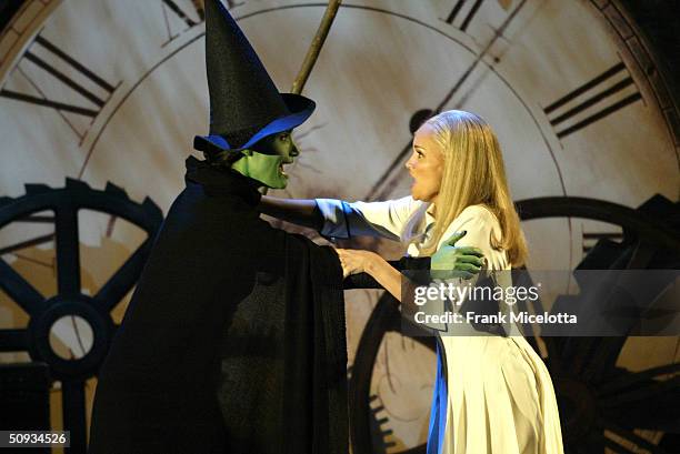 American singers and actresses Idina Menzel and Kristin Chenoweth of "Wicked" perform on stage during the "58th Annual Tony Awards" at Radio City...