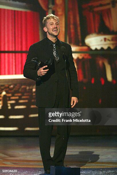 Jeff Whitty, winner of "Best Book Of A Play" for "Avenue Q" appears on stage during the "58th Annual Tony Awards" at Radio City Music Hall on June 6,...