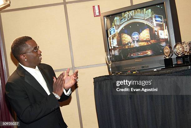 Sean P. Diddy Combs watches a monitor backstage at the "58th Annual Tony Awards" at Radio City Music Hall on June 6, 2004 in New York City. The Tony...