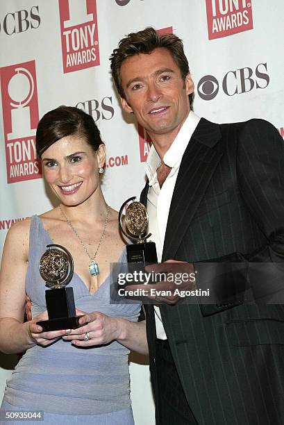 Tony Award winners Idina Menzel and Hugh Jackman pose backstage at the "58th Annual Tony Awards" at Radio City Music Hall on June 6, 2004 in New York...