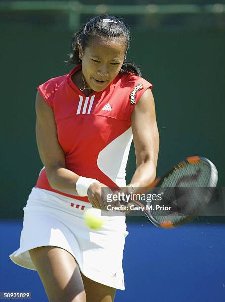Anne Keothavong of Great Britain plays a backhand during her first round match against Marta Marrero of Spain, at the DFS Classic at Edgbaston on...
