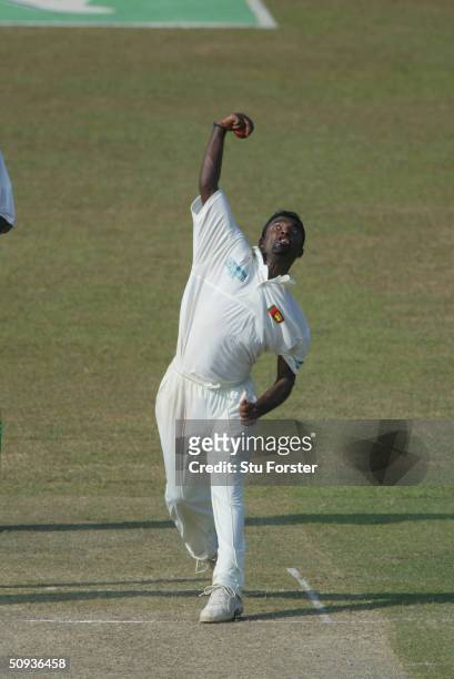 Muttiah Muralitharan of Sri Lanka bowls during the first day of the third test between Sri Lanka and England at The Sinhalese Sports Club on December...