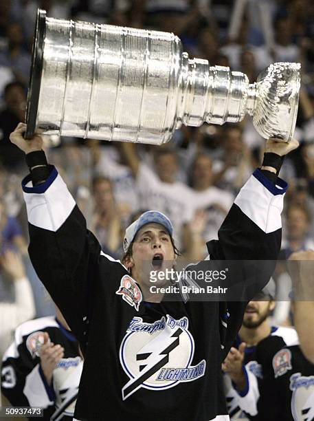 Vincent Lecavalier of the Tampa Bay Lightning skates with the Stanley Cup after defeating the Calgary Flames in game seven of the NHL Stanley Cup...