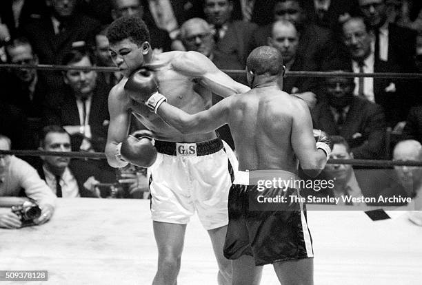 Doug Jones in action, throwing a left hook vs Cassius Clay during their heavyweight bout at Madison Square Garden, New York, New York, March 13, 1963.