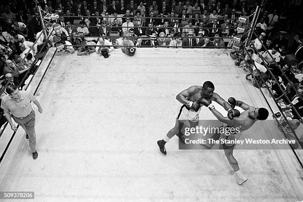 Sonny Liston in action lands a left jab vs Cassius Clay at the Convention Center in Miami Beach, Florida, February 25, 1964. Cassius Clay won the...
