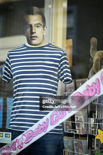 Charity shop decorates it window in Andy Murray's hometown of Dunblane where things have been turned pink to celebrate him becoming a dad yesterday...