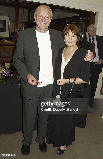 Actors Julian Glover and Isla Blair attend Sotheby's Summer Party at Sotheby's, New Bond Street on June 7, 2004 in London.