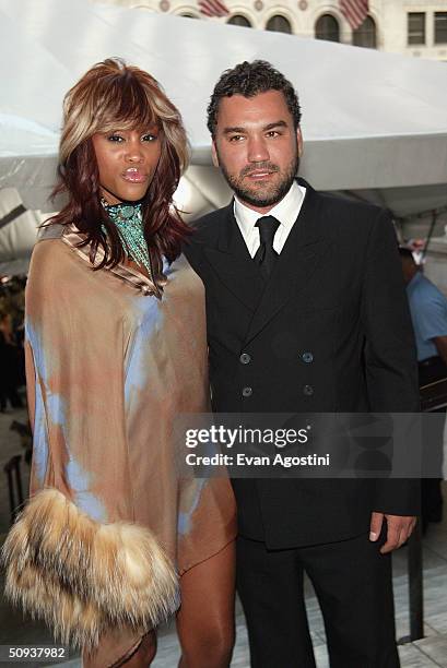 Rapper Eve and designer Edmundo Castillo attend the "2004 CFDA Fashion Awards" at the New York Public Library June 7, 2004 in New York City.