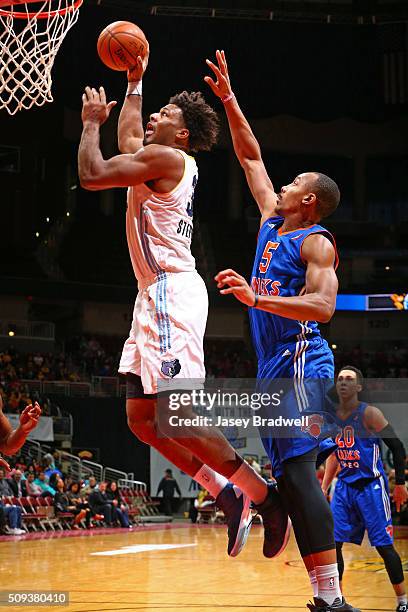 Alex Stepheson of the Iowa Energy drives to the basket around Darion Atkins of the Westchester Knicks in an NBA D-League game on February 9, 2016 at...
