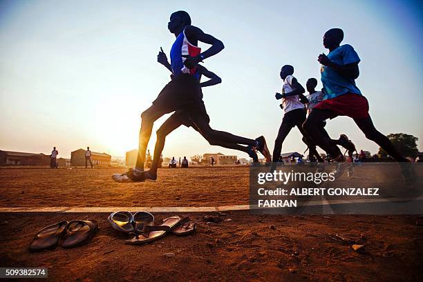 South Sudanese runners, selected by the South Sudanese Athletic Federation, train in the open field of the Buluk Athletics Track in Juba, on February...