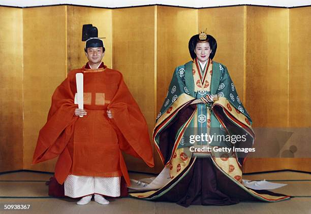 In this handout photo from the Imperial Household Agency, Crown Prince Naruhito of Japan and his future wife Masako Owada pose for photographs in...