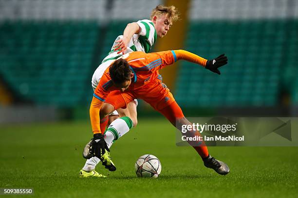 Calvin Miller of Celtic vies with Alvaro Gomez Martin of Valencia during the UEFA Youth Champions League match between Celtic and Valencia at Celtic...