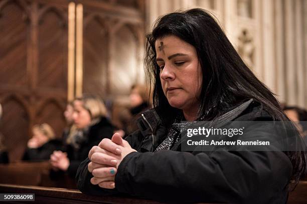 Catholics attend Ash Wednesday mass at St. Patrick's Cathedral on February 10, 2016 in New York City. The day marks the start of the lent for...