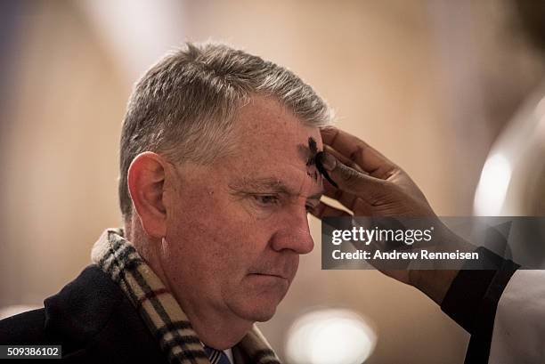 Catholics receive ashes on Ash Wednesday at St. Patrick's Cathedral on February 10, 2016 in New York City. The day marks the start of the lent for...