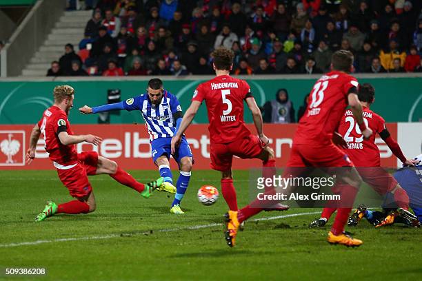 Vedad Ibisevic of Hertha Berlin scores his side's first goal during the DFB Cup quarter final match between 1. FC Heidenheim and Hertha BSC at...