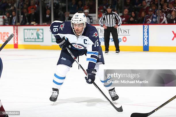 Andrew Ladd of the Winnipeg Jets waits for a face-off against the Colorado Avalanche at the Pepsi Center on February 6, 2016 in Denver, Colorado. The...