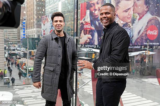 Calloway interviews Jencarlos Canela during his visit to "Extra" at their New York studios at H&M in Times Square on February 10, 2016 in New York...