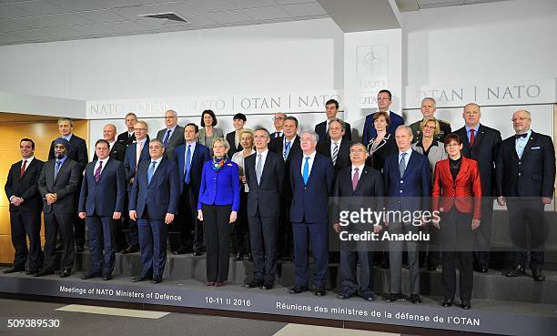 Ministers pose for a group photo during the NATO Defense Ministers meeting at the NATO headquarters in Brussels, Belgium on February 10, 2016.